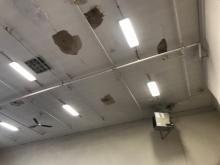 Scraped, primed, and repainted ceiling