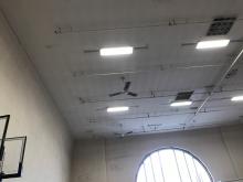 Scraped, primed, and repainted ceiling