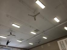 Scraped, primed, and repainted ceiling