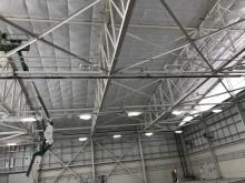 Priming and applying epoxy coating to steel at DuPage Airport Hanger 