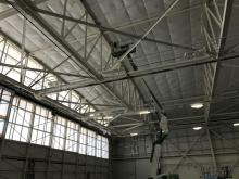 Priming and applying epoxy coating to steel at DuPage Airport Hanger 