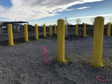 Painting of exterior pipe bollards at Union Pacific Railroad.